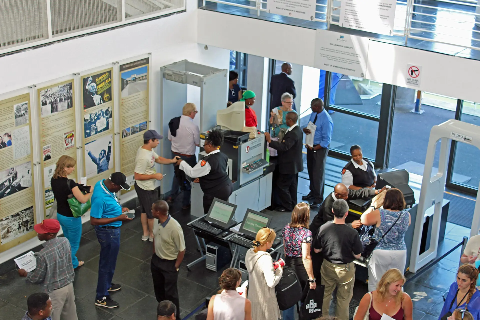 Visitors checking in for the ferry inside the Nelson Mandela Gateway