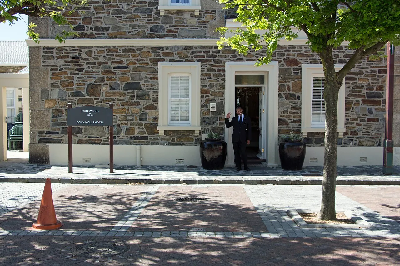 The stone front of Dock House Boutique Hotel on Portswood Ridge, V&A Waterfront
