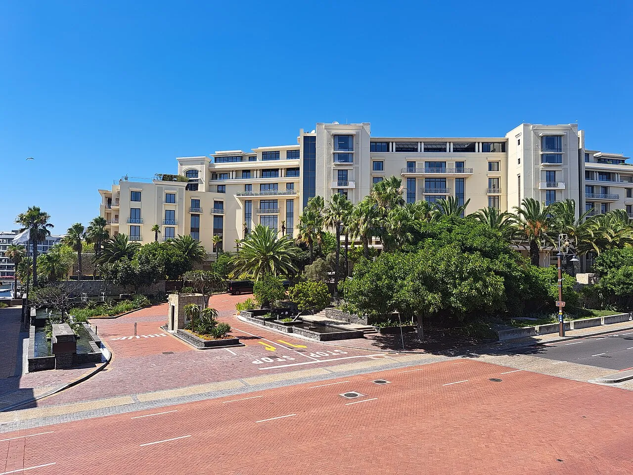 One&Only Cape Town among palm trees on Dock Road, V&A Waterfront